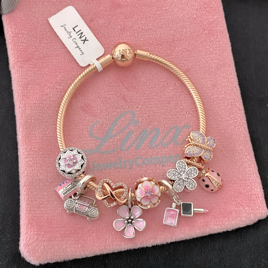 Linx Rose Gold Bracelet With Pink Rose Gold And Silver Themed Charms